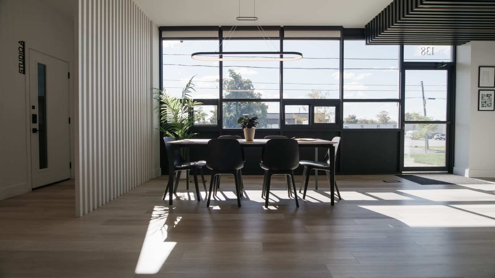 Boardroom with large windows and natural light